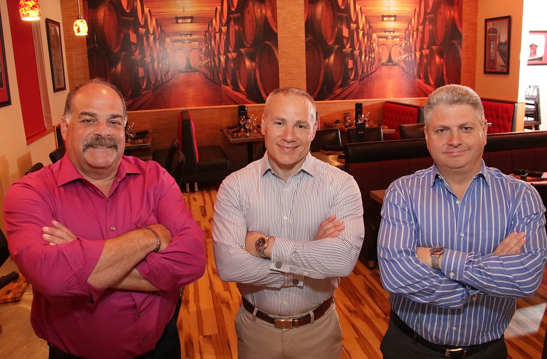 Mark Costanzo, left, has teamed upÂ with DennisÂ Valentino, middle, and David Valentino, right,Â to grow an independent restaurant company in Charlotte County.