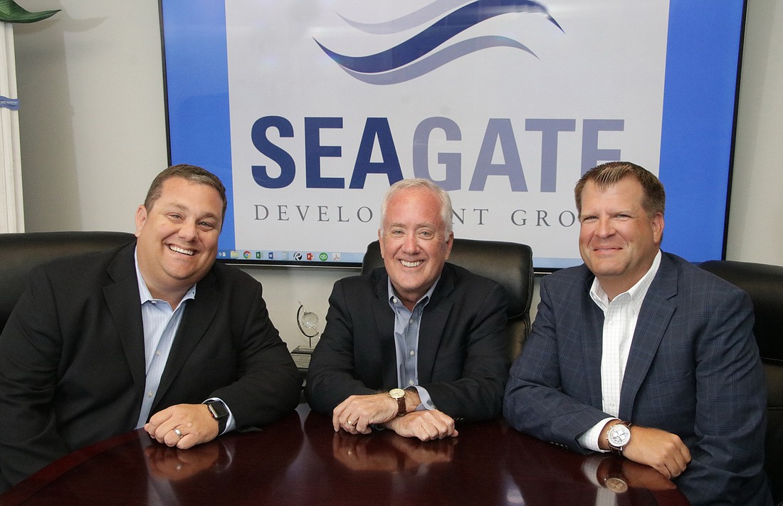From left, Matthew Price, William Price and James Nulf have built Seagate Development Group from a $17.6 million company in its first year in 2015 to a $48.8 million  in 2017.