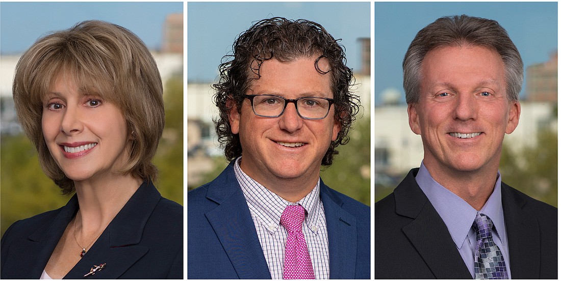 From left, Deborah Getzoff, Woodrow Pollack and Fred Werdince are new partners in Shutts & Bowen&#39;s Tampa office.