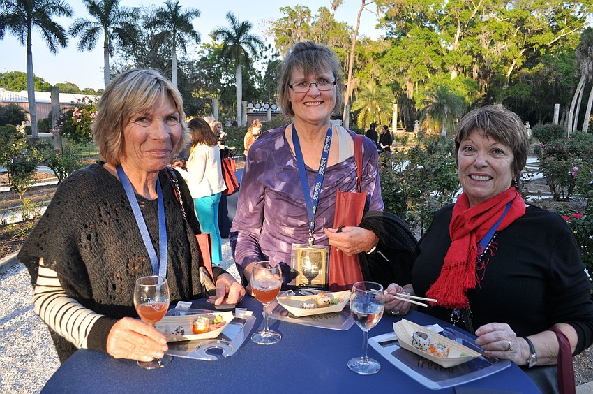 Nancy Dobras, Shirley Gaspelin and Nann Parr enjoy sushi and sake in the region of Japan on the Wine Walk.