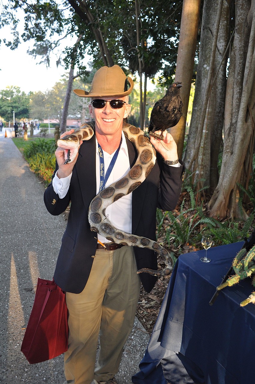 Stewart Levelle tries on funny props while visiting Australia/New Zealand during the Wine Walk.