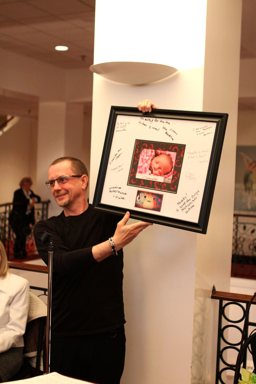 Iain Webb shows off the gift he received from All Children's Hospital.