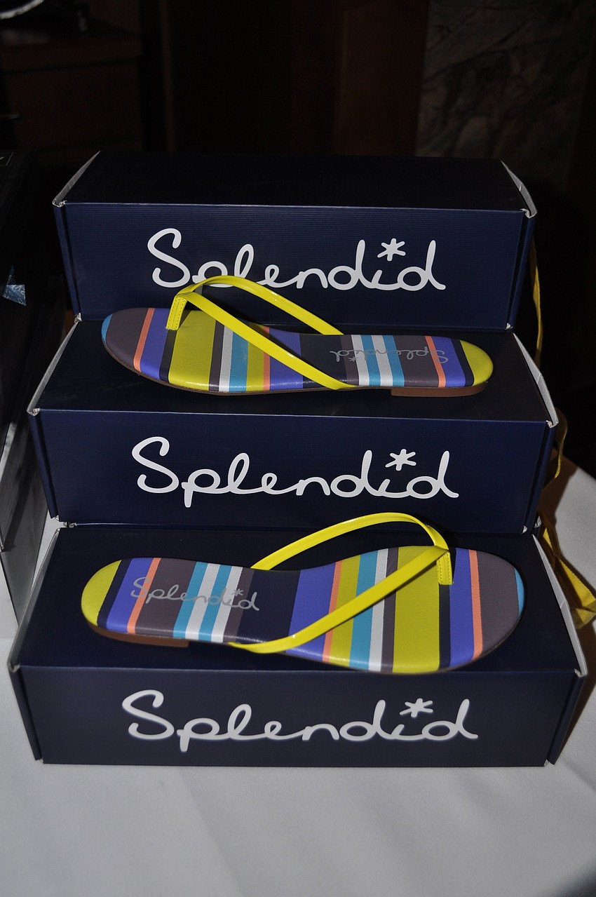 One of the many pairs of sandals being sold at the Shore table.