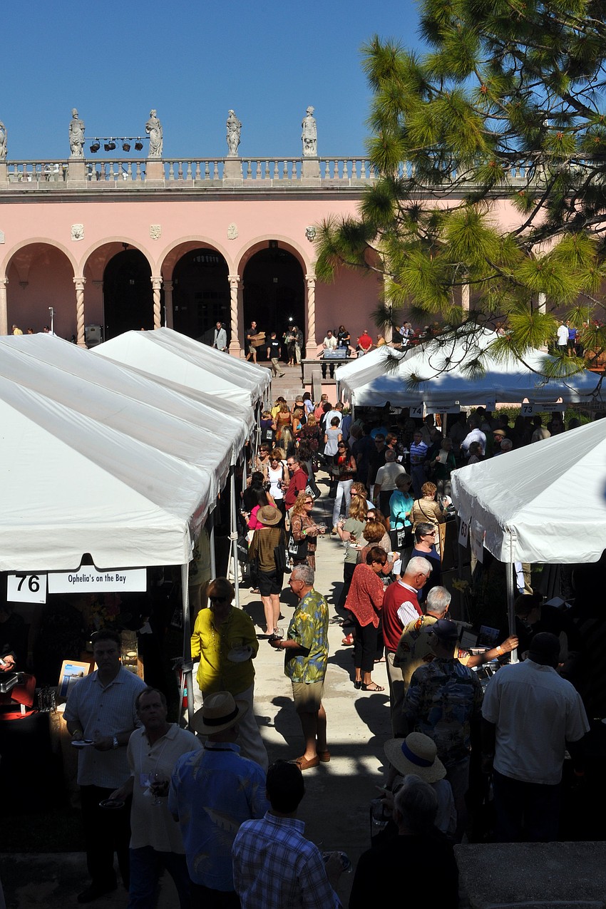 People made their way from tent to tent trying different food and wines Sunday, Jan. 27.