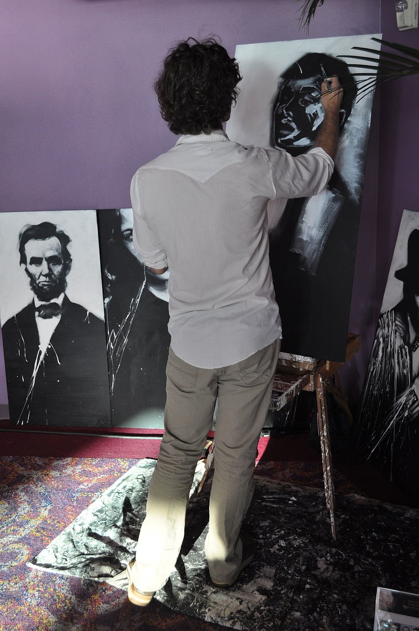 Tony Corbitt created black and white paintings of Sheryl Crow, Jim Henson and Audrey Hepburn during the gala.