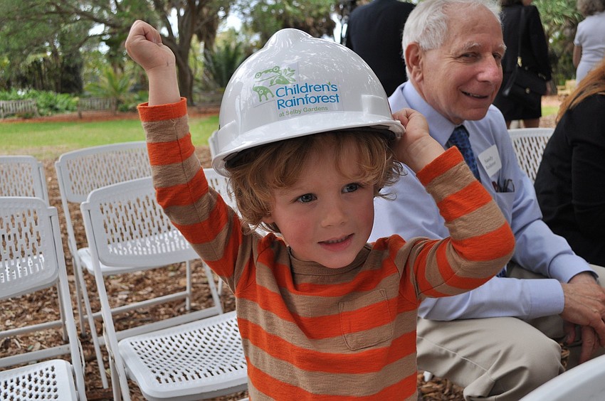 Magnus has fun wearing one of the hard hats at the reception.