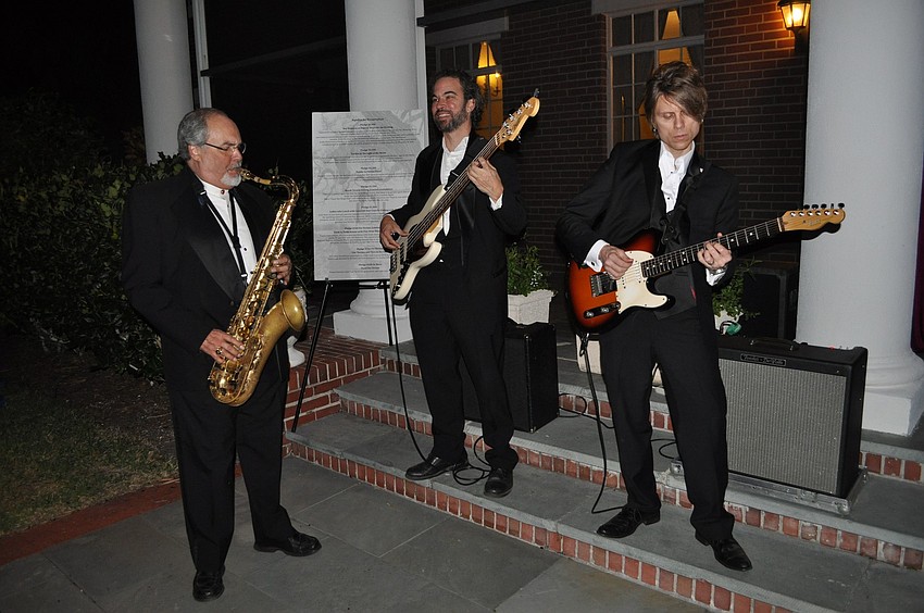 A small band played out behind the mansion.