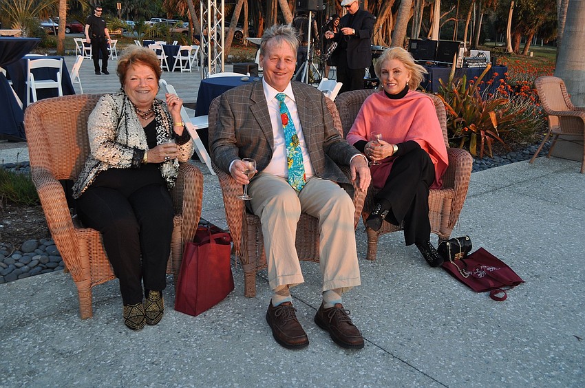 Becky Oâ€™Donnell, Harold Dittmar and Lynn Duvall watch the sunset in the region of France.