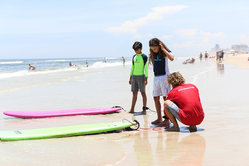 For the past 16 years Surfari Surf Shop has been offering summer surf camps next to the Granada beach approach. File photo by Paige Wilson