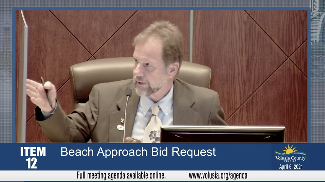 Volusia County Council Chair Jeff Brower presents his idea of naming rights for beach approaches. Courtesy of Volusia County Government