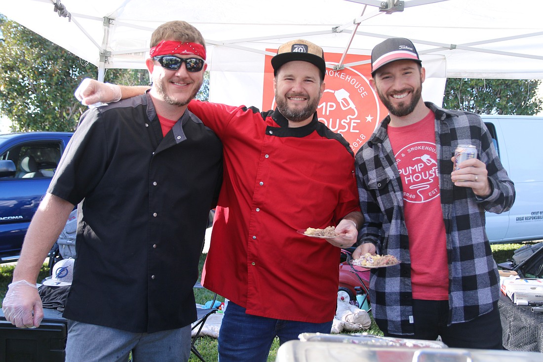 Bryon Brymer, Rob West and James Freidman of the Pumphouse BBQ and Smokehouse, in last year's Taste of Ormond. Photo by Jarleene Almenas