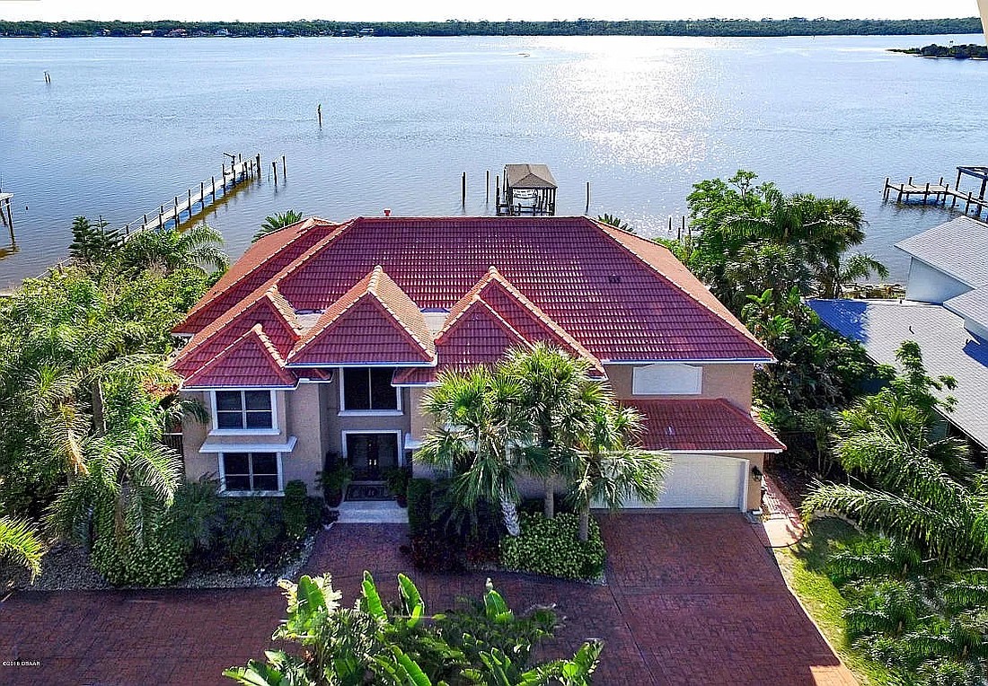 The house on John Anderson drive has a swimming pool, boat dock and boat house. Courtesy photo