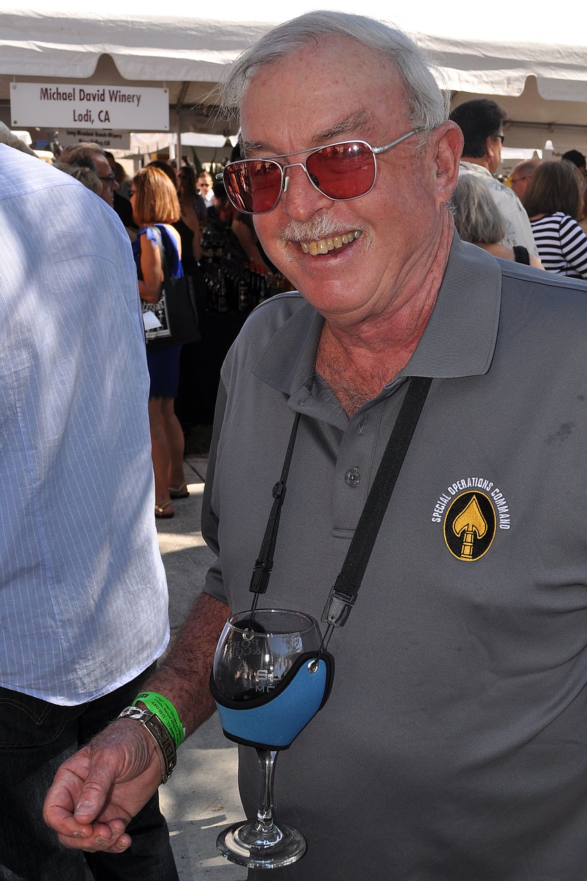 Mac MacIssac had a handy wine glass holder around his neck so that he could be hands-free during the Grand Tasting.