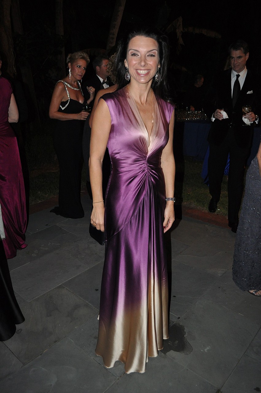 Aimee Cogan wore a Nicole Miller dress