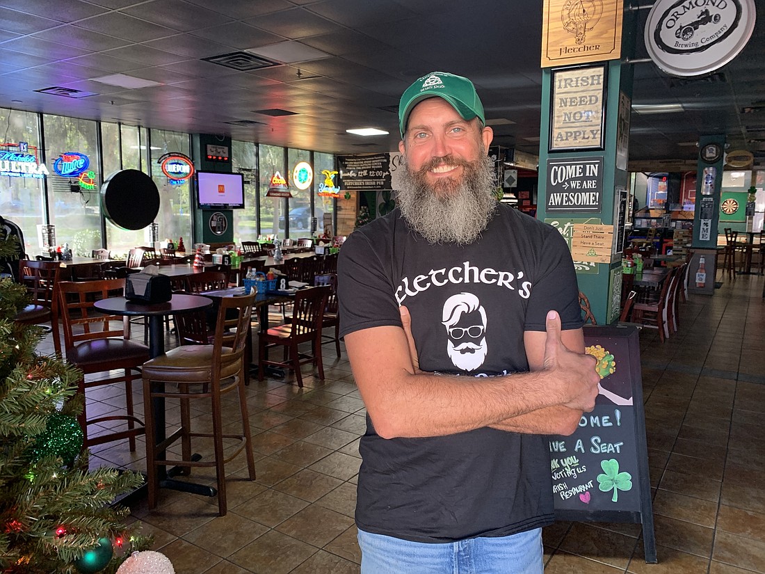 Bill Fletcher, owner of Fletcher's Irish Pub, said his beard is his trademark. But he's cutting it loose â€” for a cause. (It will grow back.) Photo by Brian McMillan