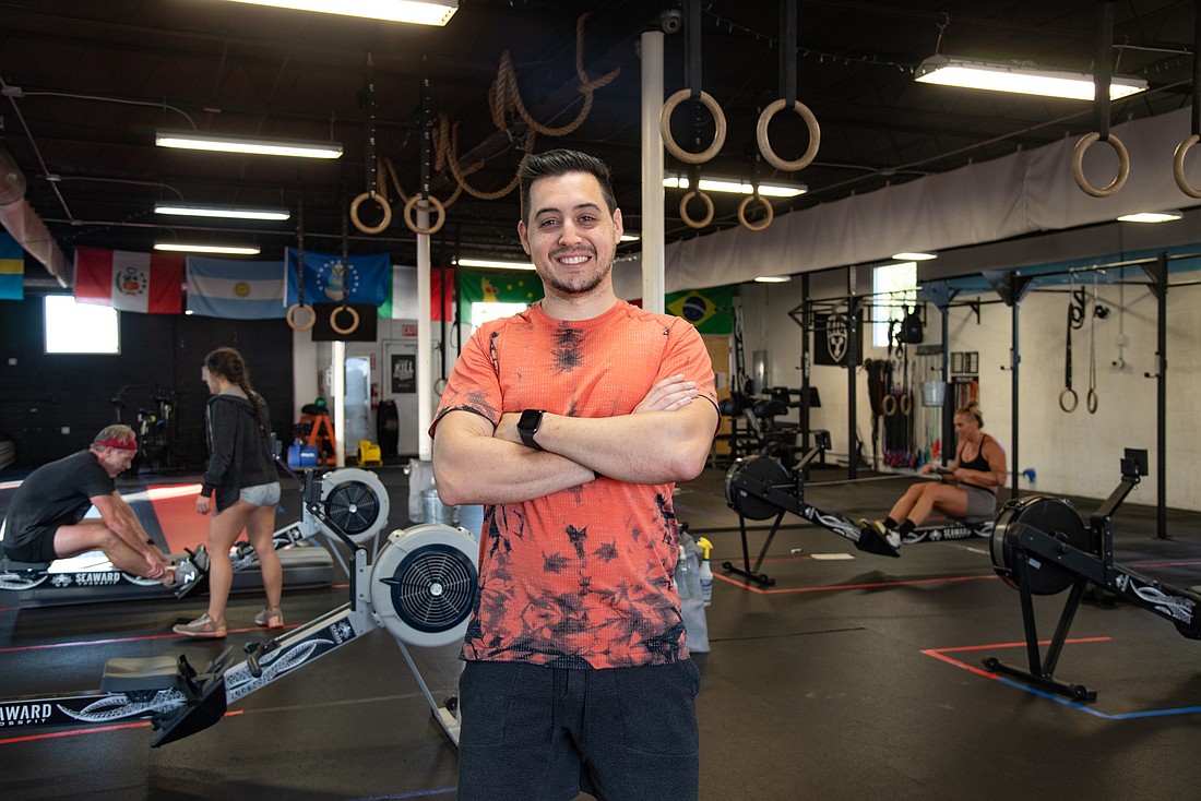 Sax. Michael Calamaras has attended his fair share of different CrossFit gyms but the one constant is the good attitude at all of them.