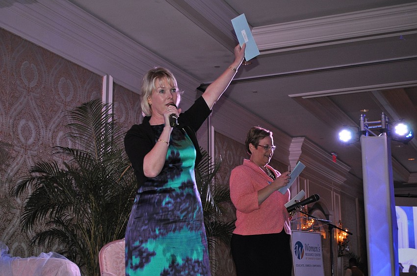 Veronica Brady and Jocelyn Stevens encourage everyone to donate money to the Womenâ€™s Resource Center.