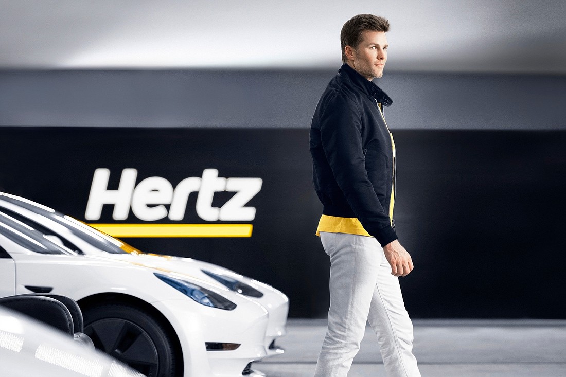 Tampa Bay Buccaneers quarterback Tom Brady is the face of The Hertz Co.&#39;s electric vehicle push, which has grown with the Polestar partnership. (Courtesy photo)