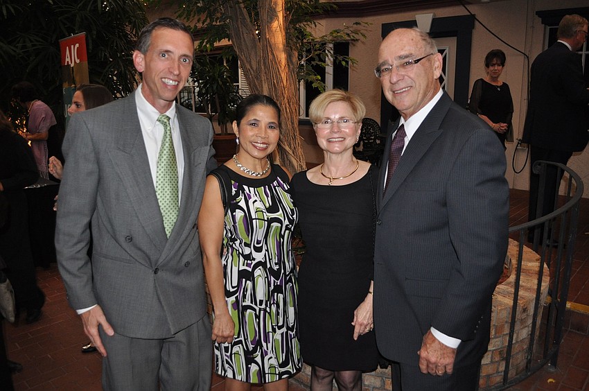 Jeff Grebe, Bich Mai Aunders and Joyce and Sheldon Paley