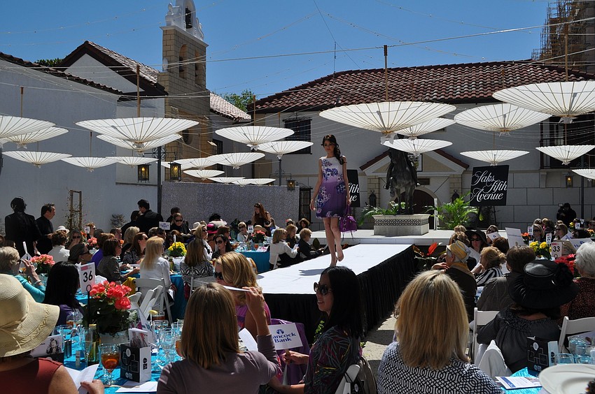 The fashion show included both women and men's fashions.