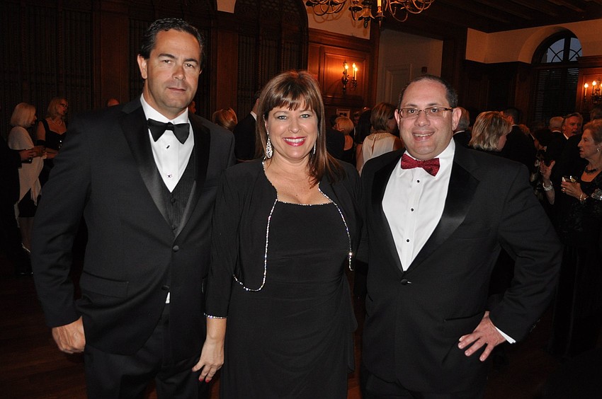 Etienne and Kimberly Bleach with Jason Reilly