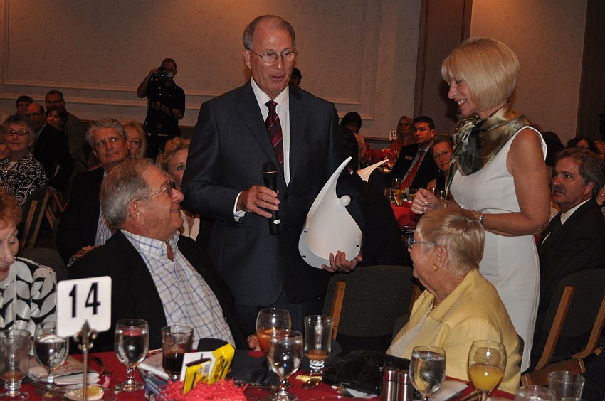 The Haspels presented Warren and Margot Coville with their award