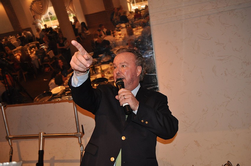 Michael Klauber served as live auctioneer