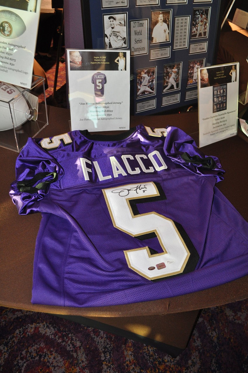 One of the most popular items was the Baltimore Ravens jersey signed by the Superbowlâ€™s MVP Joe Flacco.