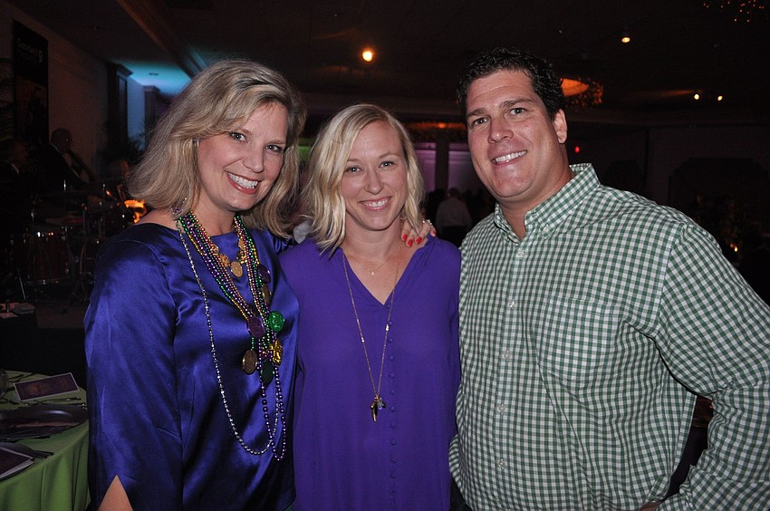 Amanda Morris with Ashley and Ryan Carson