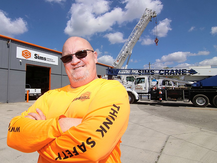 Kenny Brass oversees a crew of more than two dozen workers at Sims Crane in Fort Myers.