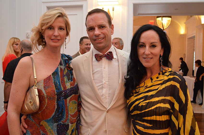 Brenda and Geoffrey Michel with Ashley Kozel