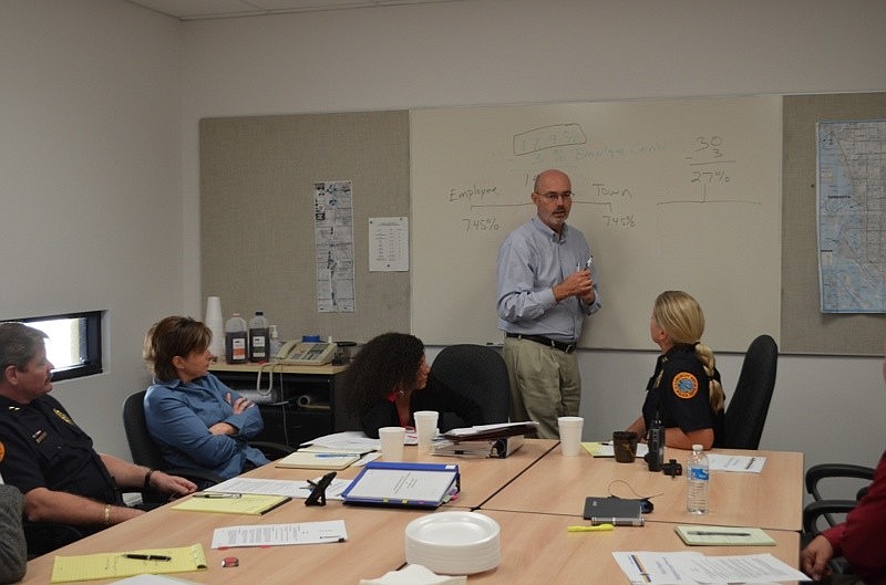 Town Manager Dave Bullock discusses a new pension plan with the Longboat Key Police Department Union last week.