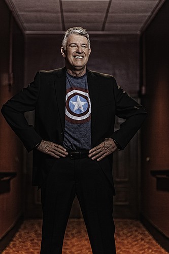 Michael Donald Edwards poses in a cape while promoting the musical production "Hero," featured in the upcoming 2013-2014 season.