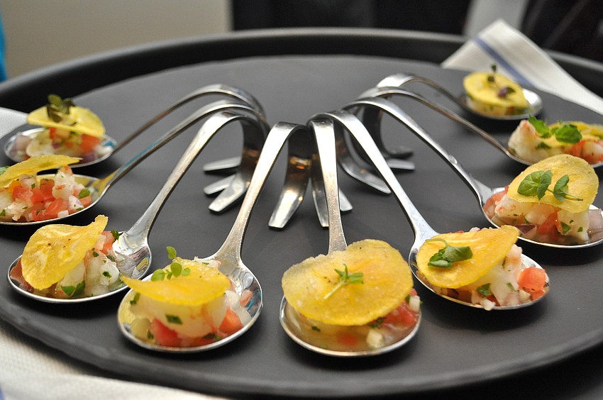 Jackâ€™s Ceviche featuring Rock Shrimp, Jicima, tomatoes, peppers, onions and lime juice topped with a plantain chip