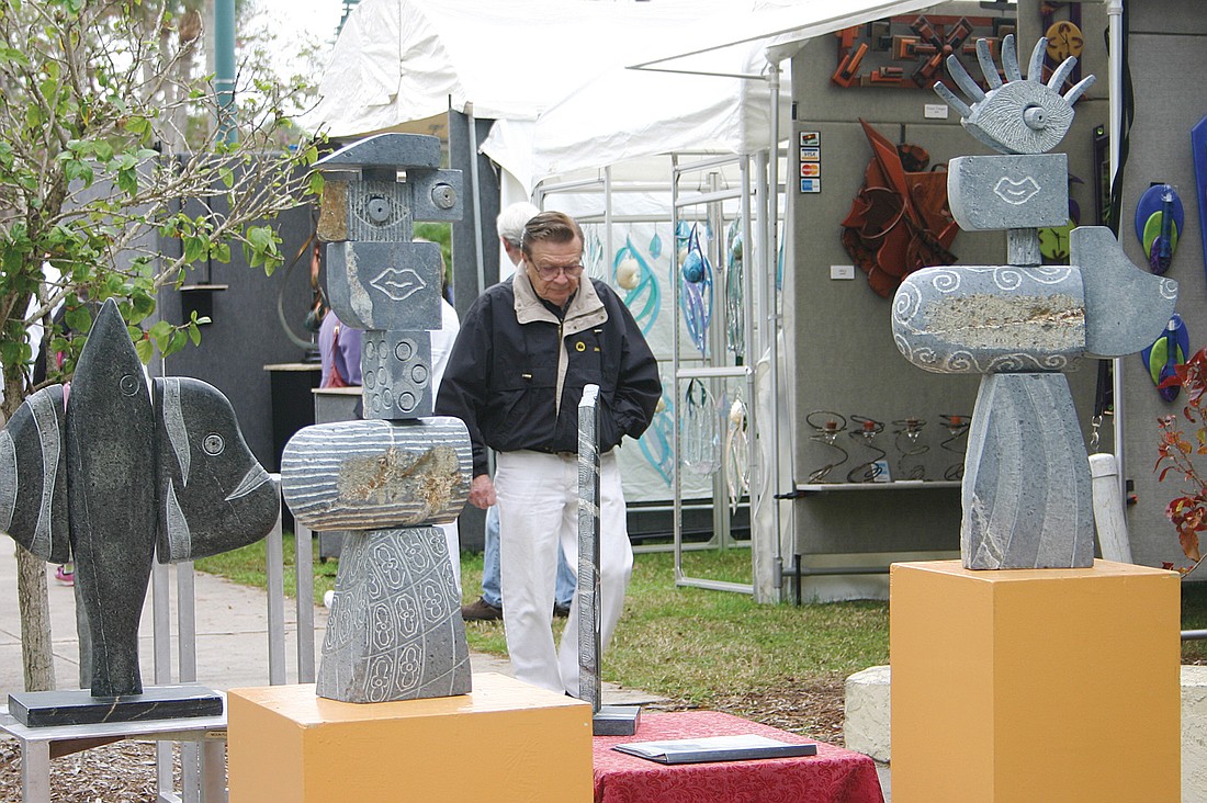 Attendees can shop for a variety of handmade objects such as  $15 silver bracelets and life-sized sculptures in excess of $50,000. File photo.