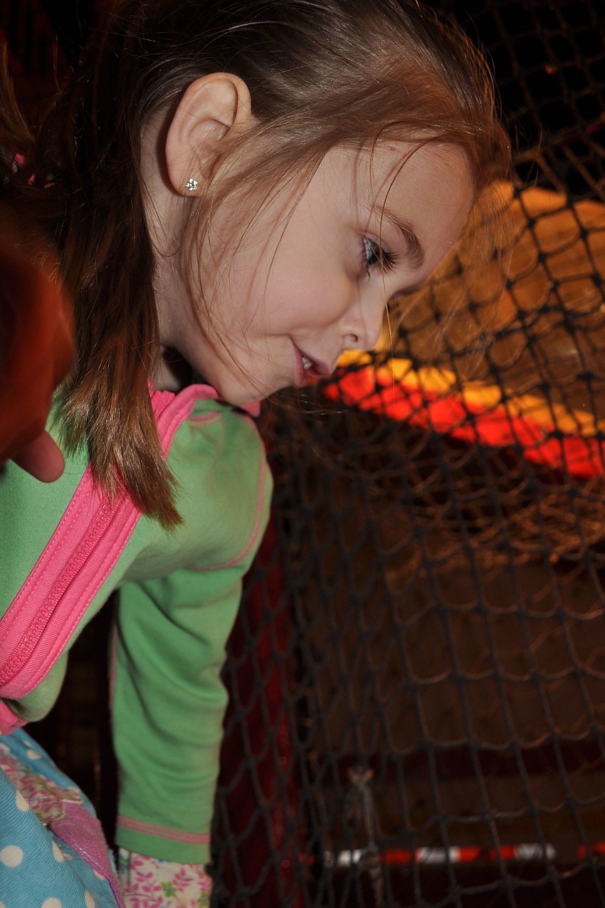 Edan Armistead, 4, kept busy in the Castle Mania attraction.