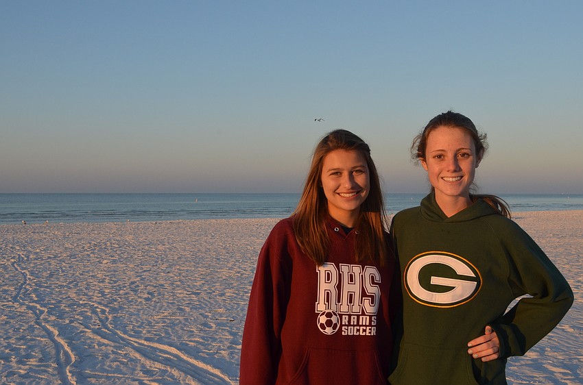 Volunteers Marcy Camelo and Amy Scheb