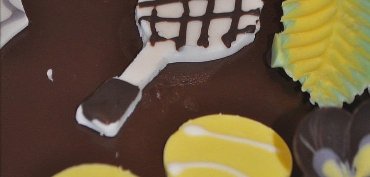 The Longboat Key Club marked the occasion with a tennis-themed cake.
