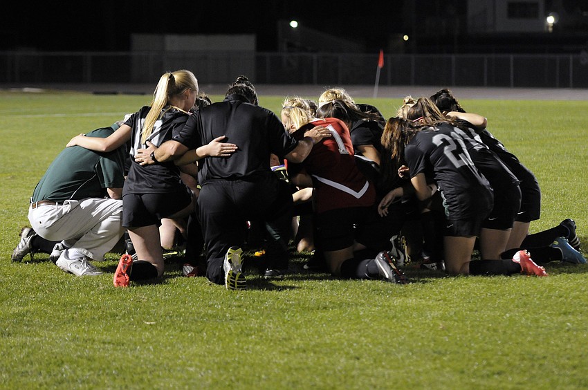 The Lakewood Ranch High girls soccer team huddles together before the start of its Class 4A-Region 3 final versus Plant City.