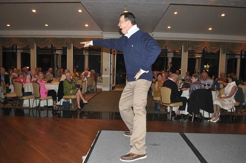 Tennis pro Claudiu Retean struts down the catwalk.