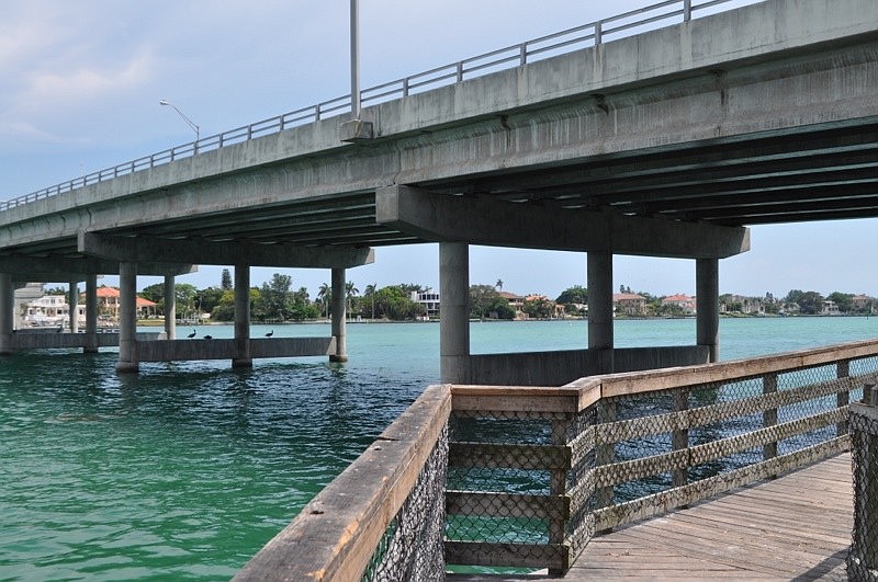 The Florida Department of Transportation is in the process of painting New Pass Bridge.