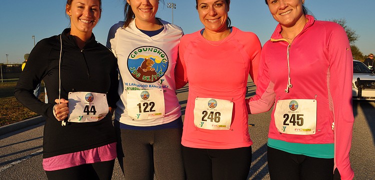 Christina Despot, Kelsie MacMillan, Stacey Royce and Lauren Deubert have made a goal to complete one race together each month.