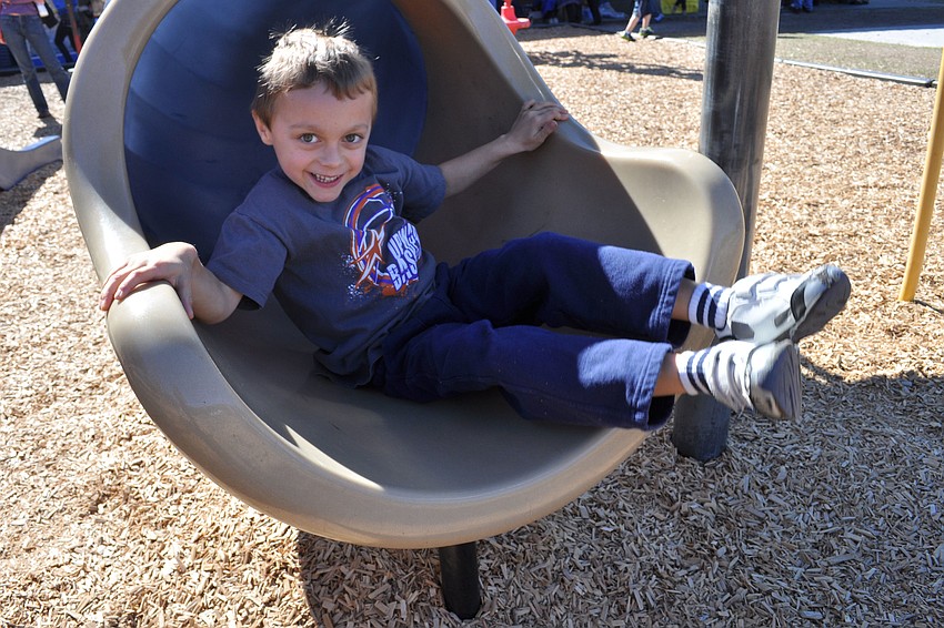 Austin Bruce, 6, couldnâ€™t get enough of the slide.