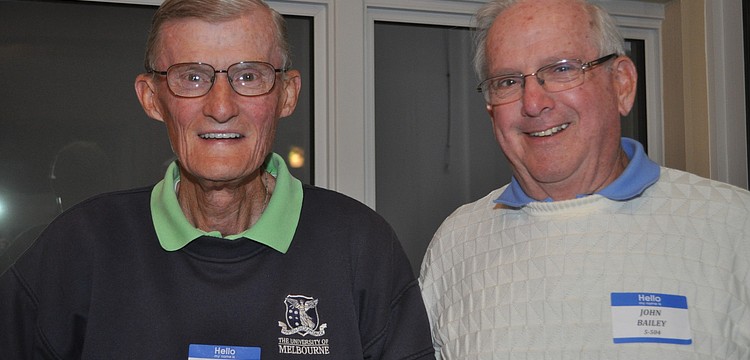 John Brouder and John Bailey tend bar at the Beachplace Super Bowl party.