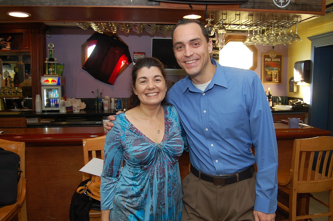 Siesta Key Village Association members Lourdes Ramirez and Kevin Cooper stopped to chat after the Feb. 5 meeting of the merchant group.