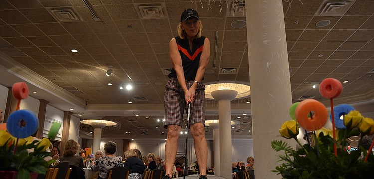 Cheryl Cummerow models a Sport Haley top and shorts from Dilliardâ€™s.