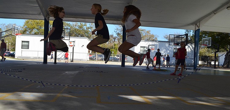 Siabhan Boyle, Sophia Joerger and Ciara Tomlinson jump rope together.