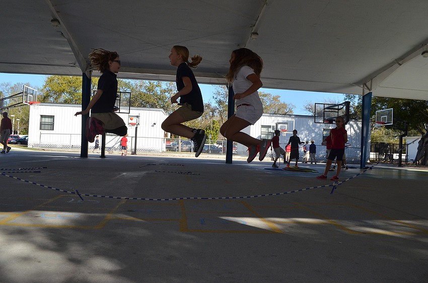 Siabhan Boyle, Sophia Joerger and Ciara Tomlinson jump rope together.