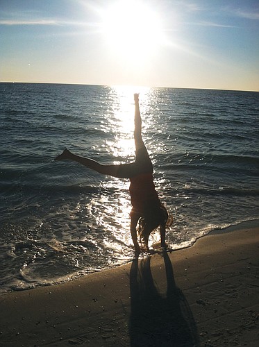 East County resident Stephanie Ferber submitted this photo of Isabella Ferber doing cartwheels on the beach at sunset on Anna Maria Island.