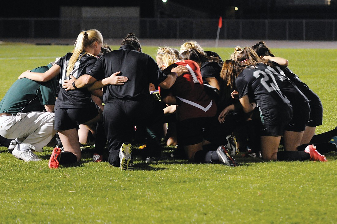 The Lakewood Ranch High girls soccer team huddles together before the start of its Class 4A-Region 3 final versus Plant City Jan. 29.